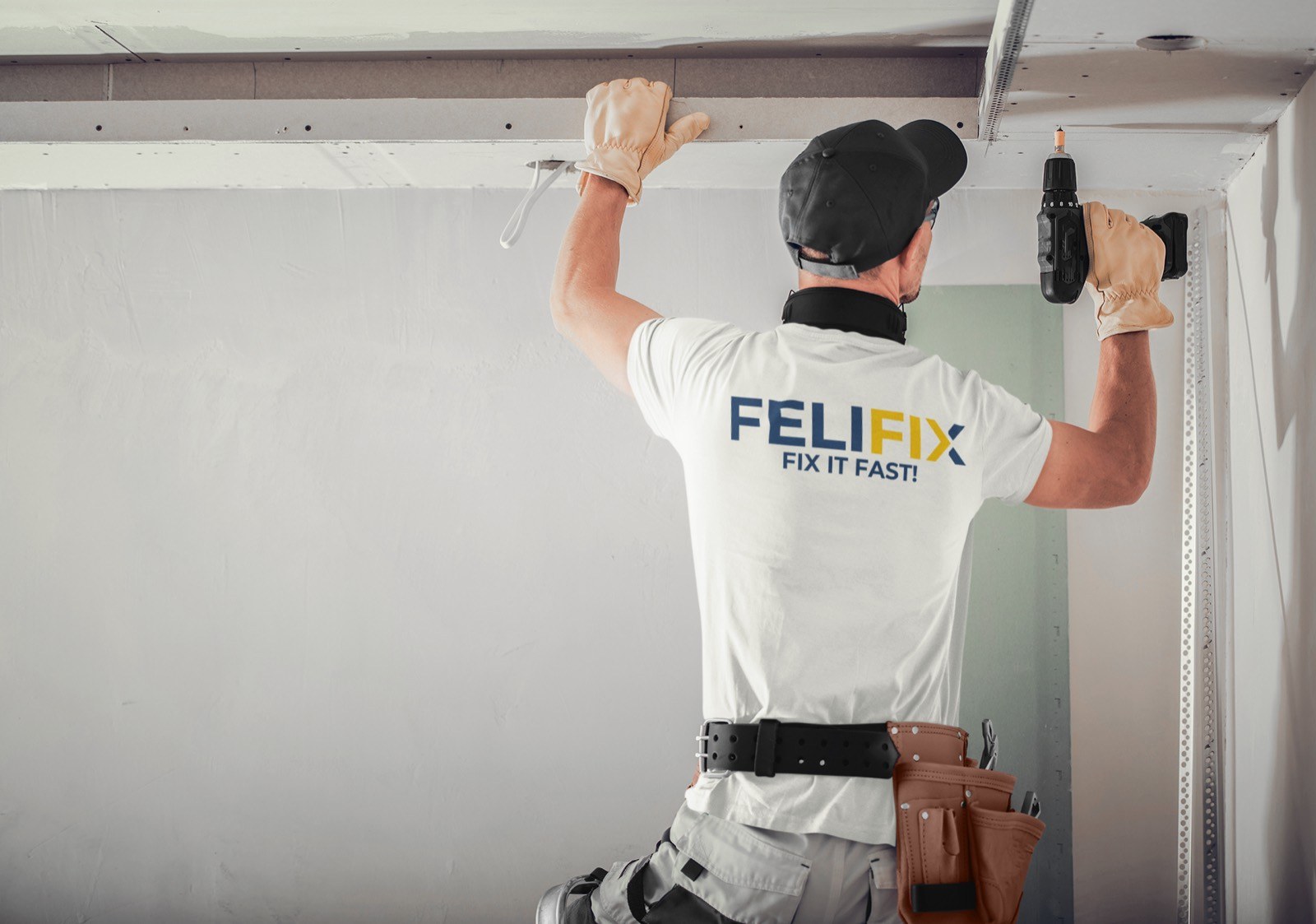 FeliFix technician installing a ceiling fixture